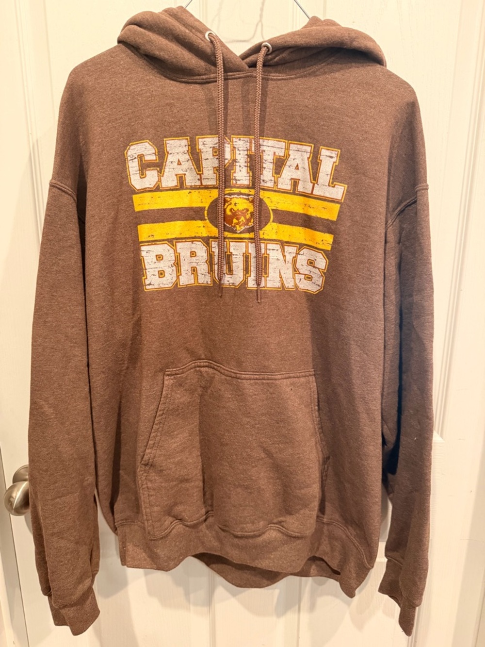 Capital Bruins Brown Graphic Hoodie with Yellow Accent